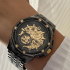 BULOVA 98A293 unisex Octava Automatic 251 Crystal Full Skeleton Gold Tone Detail Deep Gray Stainless Steel 42mm